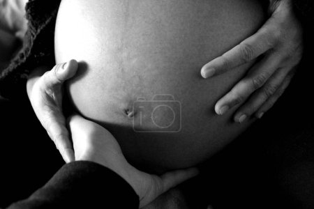 Pregnant woman waiting for her beloved child - heart