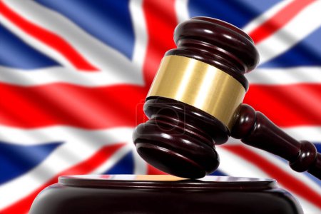 Foto de Flag of Great Britain, court of law and a judge gavel - Imagen libre de derechos
