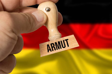 Téléchargez les photos : Drapeau de l'Allemagne et timbre Pauvreté - en image libre de droit