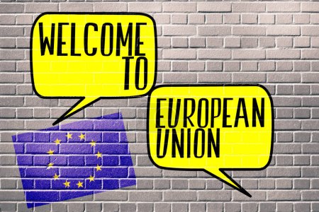 Foto de Collage ilustración con bienvenida a la inscripción de la unión europea en burbujas de voz en la pared de ladrillo - Imagen libre de derechos