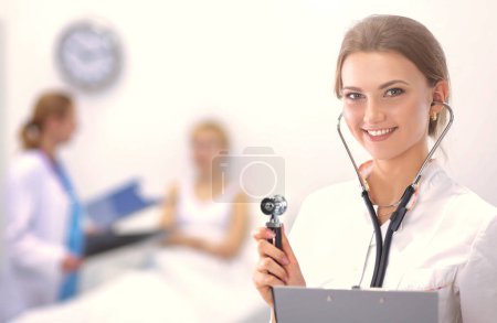 Photo for Portrait of woman doctor standing at hospital. - Royalty Free Image