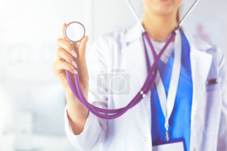 Photo for Smiling medical doctor woman with stethoscope in hospital. - Royalty Free Image