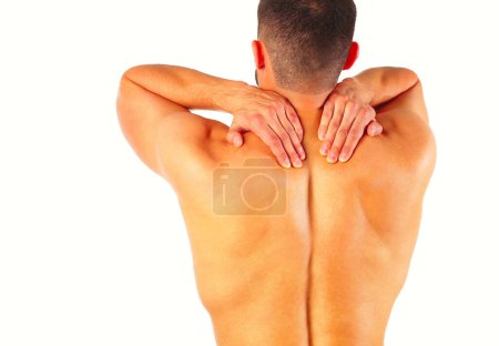 Photo for Young man holding his neck in pain. Medical concept. - Royalty Free Image