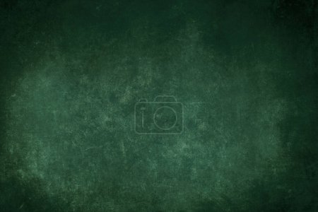 Photo for Pine green grunge background with dark vignette borders and grungy texture - Royalty Free Image