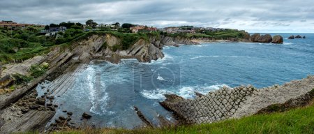 Photo for A cove in formation process due to the erosion of the Cantabrian Sea in the Broken Coast (Costa Quebrada), Pielagos, Spain. - Royalty Free Image