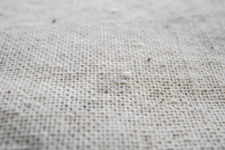 Photo for Macro detail of woven white linen natural fabric texture background, selective focus - Royalty Free Image