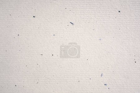 Photo for Recycled artisan paper mottled with natural fibres, luxury eco paper background - Royalty Free Image