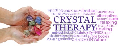 Téléchargez les photos : Crystal therapy word cloud  on white - female cupped holding a selection of colourful tumbled healing stones against a white background with a relevant word cloud - en image libre de droit