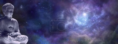 Photo for Mindfulness Buddha sitting gazing out into deep space - lotus position meditating buddha on left size against a starry dark blue celestial sky with a massive nebula and copy space for text - Royalty Free Image