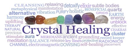 Photo for Chakra Crystal Therapy Word Cloud - eight rainbow coloured tumbled gem stones in a neat row surrounded by a relevant Crystal Healing word cloud isolated on a white background - Royalty Free Image