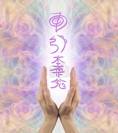 Sending out the three Reiki Attunement Symbols - Female healer's hands with lilac Reiki symbols floating between in a shaft of white light against multicoloured ethereal background 