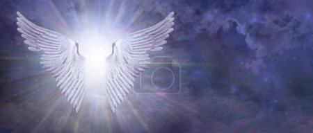 Photo for Shimmering Silver Angel Light Message Template - Pair of outstretched Angel Wings with bright white light between against a blue night sky background with copy space for text - Royalty Free Image