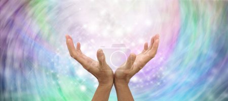 Photo for Reiki Healers Energy Vortex Background - open hands sparkles and white light with copy space all around on a beautiful gentle pastel coloured ethereal background ideal for healing theme - Royalty Free Image
