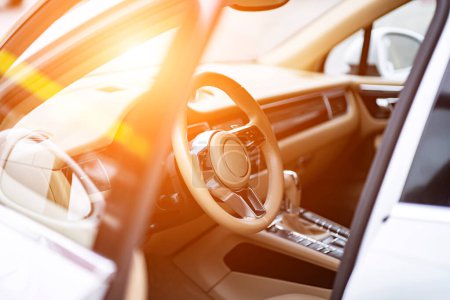 Téléchargez les photos : Multimedia control panel on the steering wheel of modern car - en image libre de droit