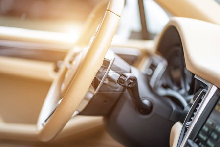 Téléchargez les photos : Multimedia control panel on the steering wheel of modern car - en image libre de droit