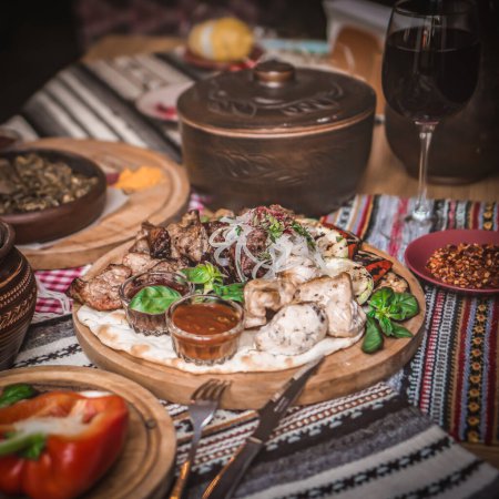 Photo for Ramadan kareem Iftar party table with assorted festive traditional Arab dishes - Royalty Free Image