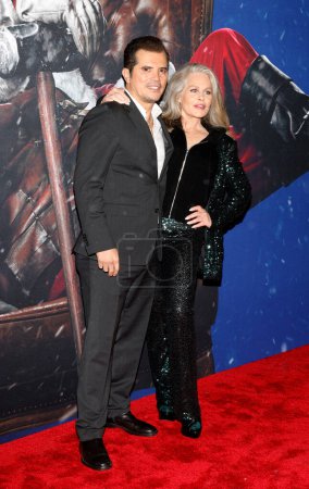 Photo for Los Angeles, CA,  - Nov 29, 2022: John Leguizamo and Beverly D'Angelo arrive at the movie premiere of "Violent Night" at TCL Chinese Theatre - Royalty Free Image