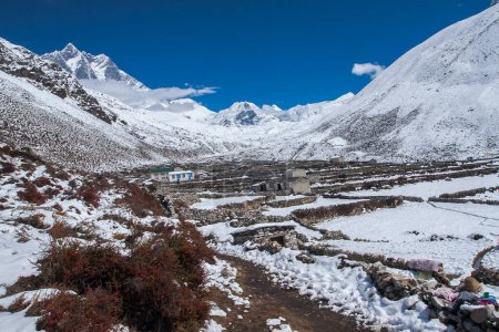 Photo for DINGBOCHE, NEPAL - CIRCA OCTOBER 2013: view of Island Peak in the village of Dingboche circa October 2013 in Dingboche. - Royalty Free Image