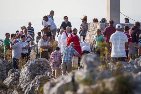 Photo for Holy Mass on the top of Sveti Nikola highest on the island of Hvar circa September 2016 in Hvar. - Royalty Free Image