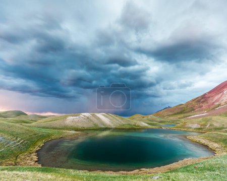 Photo for Beautiful view of Tulpar Kul lake in Kyrgyzstan during the storm - Royalty Free Image