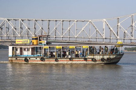 Photo for CALCUTTA, INDIA - CIRCA NOVEMBER 2013: bridge over a river in Kolkata circa November 2013 in Calcutta. - Royalty Free Image