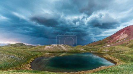 Beautiful view of Tulpar Kul lake in Kyrgyzstan during the storm