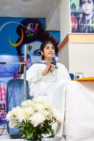 Photo for New Delhi, India, October 16 2022 - BK Shivani during meditation session, Shivani Verma, better known as BK Shivani, is a teacher in the Brahma Kumaris spiritual yoga and meditation movement of India - Royalty Free Image