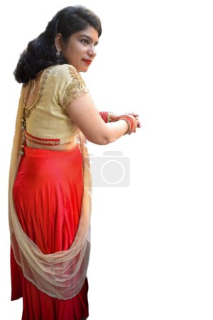 Photo for Beautiful woman dressed up as Indian tradition with henna mehndi design on her both hands to celebrate big festival of Karwa Chauth with plain white background - Royalty Free Image