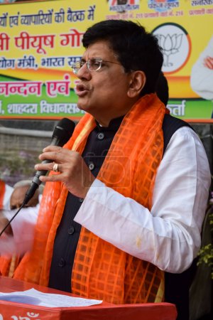 Photo for New Delhi, India - November 27 2022 - Piyush Goyal Cabinet Minister and core member of Bharatiya Janata Party (BJP) during a rally in support of BJP candidate ahead of MCD local body Elections 2022 - Royalty Free Image