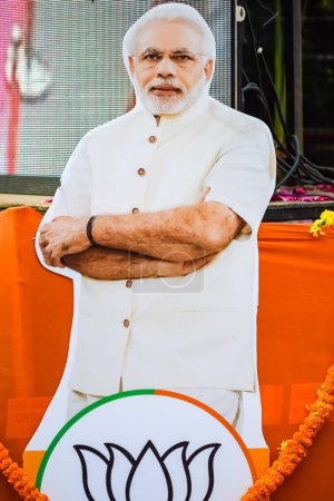 Photo for New Delhi, India - January 16 2023 - Prime Minister Narendra Modi cut out during BJP road show, the statue of PM Modi while attending a big election rally in the capital - Royalty Free Image