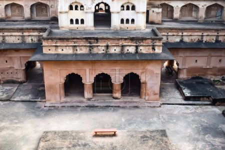 Beautiful view of Orchha Palace Fort, Raja Mahal and chaturbhuj temple from jahangir mahal, Orchha, Madhya Pradesh, Jahangir Mahal (Orchha Fort) in Orchha, Madhya Pradesh, Indian archaeological sites mug #695818974