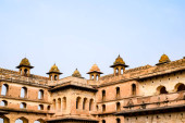 Beautiful view of Orchha Palace Fort, Raja Mahal and chaturbhuj temple from jahangir mahal, Orchha, Madhya Pradesh, Jahangir Mahal (Orchha Fort) in Orchha, Madhya Pradesh, Indian archaeological sites Poster #696586770