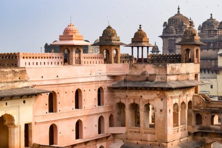 Beautiful view of Orchha Palace Fort, Raja Mahal and chaturbhuj temple from jahangir mahal, Orchha, Madhya Pradesh, Jahangir Mahal - Orchha Fort in Orchha, Madhya Pradesh, Indian archaeological sites Poster 706324522