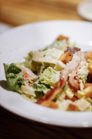 Photo for Healthy Grilled Chicken Caesar Salad with Cheese and Croutons. High quality photo - Royalty Free Image
