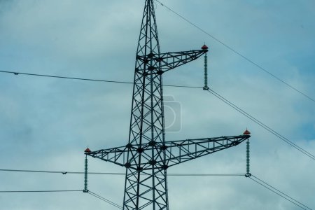 Photo for High voltage towers with sky background. Power line support with wires for electricity transmission. High voltage grid tower with wire cable at distribution station. Energy industry, energy saving. - Royalty Free Image