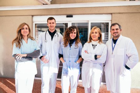 Photo for Committed medical staff in front of their workplace. - Royalty Free Image