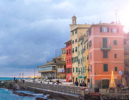 Foto de Colorful old houses near blue italian sea in Genova ,Italy,district Boccadasse. - Imagen libre de derechos