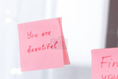 Photo for Inspirational quotes on pink sticker on the mirror,handwriting text. - Royalty Free Image