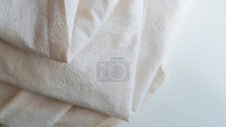 minimalistic white crumpled fabric with pattern.
