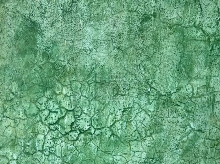 Foto de Pared de yeso verde con fondo de textura crujiente en Oaxaca, México. - Imagen libre de derechos