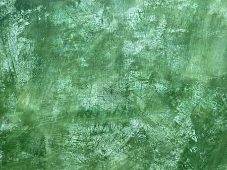 Foto de Pared de yeso verde con fondo de textura crujiente en Oaxaca, México. - Imagen libre de derechos