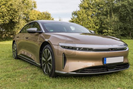 Photo for RALSKO ,CZECH REPUBLIC - 19 Sept 2023. LUCID Air. LUCID AIR luxury car on a meadow near the forest. Modern electric car LUCID. - Royalty Free Image