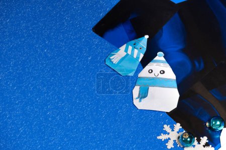 Photo for Christmas radiology - X-rays, snowmen and snowflakes on a blue background, a place for text. - Royalty Free Image
