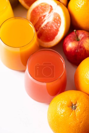 Photo for Different fruit juices in glasses on white background. - Royalty Free Image