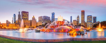 Photo for Panorama of Chicago skyline  with skyscrapers and Buckingham fountain at sunset - Royalty Free Image