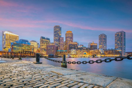 Photo for Panorama view of Boston skyline with skyscrapers over water at twilight in United States - Royalty Free Image