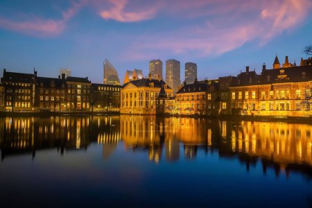Photo for Binnenhof castle (Dutch Parliament) cityscape downtown skyline of  Hague in Netherlands at sunset - Royalty Free Image