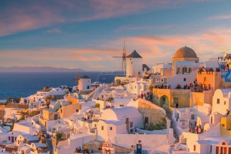 Photo for Cityscape of Oia town in Santorini island, Greece. Panoramic view at the sunset. - Royalty Free Image