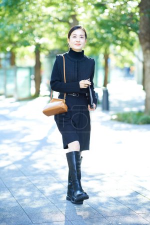 Photo for Asian fashionable business woman portrait outdoors - Royalty Free Image