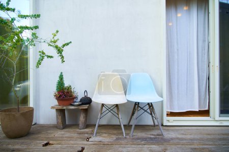 Photo for Two chairs on the balcony outdoors - Royalty Free Image
